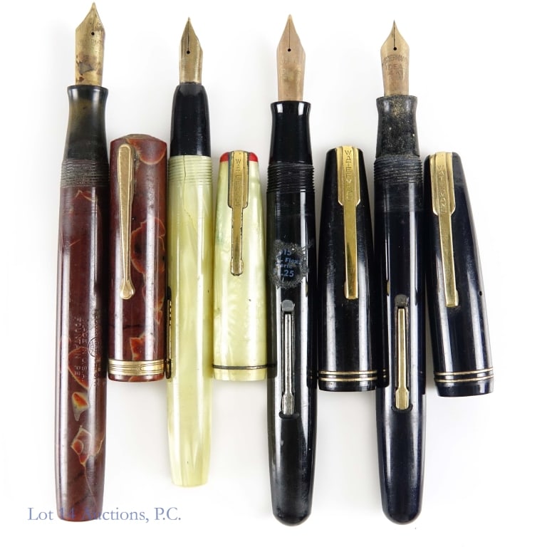 Waterman's Fountain Pens (4): Four older fountain pens. All four pens show wear to varying degrees. They are all untested. The brown pen is a Waterman's Ideal fountain pen (Reg U.S. Pat. Office) **** The dark blue pen is a Waterma