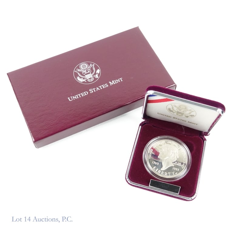 1993-S USA Silver Proof Thomas Jefferson $1 in OGP: 1993-S United States silver proof Thomas Jefferson 250th Anniversary dollar (San Francisco Mint) with COA in OGP. Designer James Ferrell. Metal is 90% silver, weighs 26.73 grams (per COA ASW 0.76 ozt.
