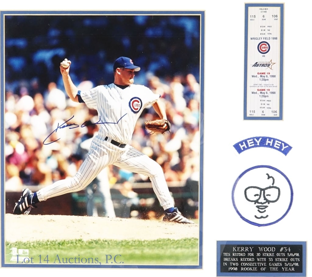 Kerry Wood Signed 20K Display (W/ Full Ticket**): Kerry Wood Autographed 20 Strikeout Display (W/ Full Ticket** - See Notes Below). (Frame Measures 23X21). ** The front of the ticket looks authentic, but we have not been able to verify the backside d