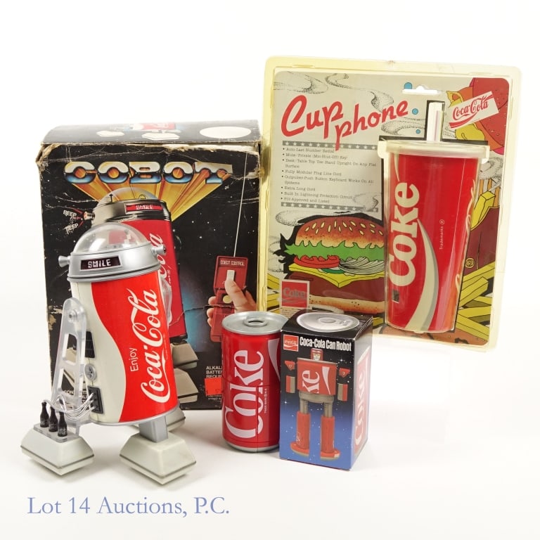 Coca-Cola Can Robot, Cobot & Phone (3): Coca-Cola Can Robot, Cobot & Phone (3). Three Coca-Cola themed blasts from the past. Late 70's Korean made Cobot (eerily similar to R2-D2) in original packaging, missing remote control, tears on box a