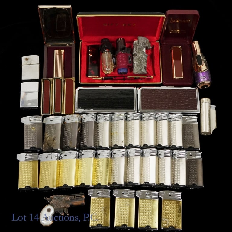 Large Lighter Collection (40): Large Lighter Collection (+40). Collection of over 40 lighters including Calibri, Five Star, Zippo, Lucienne, Modern Angel Mascot and more. Conditions vary so see photos for more details.