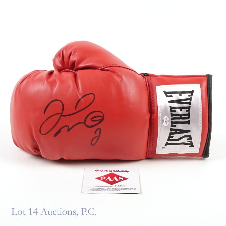 Floyd Mayweather Jr. Signed Boxing Glove W/COA: Left hand Everlast boxing glove signed by Floyd Mayweather Jr. Mayweather signed with a black Sharpie and the signature has a COA from P.A.A.S (certificate number 32397). Certificate # verified on the