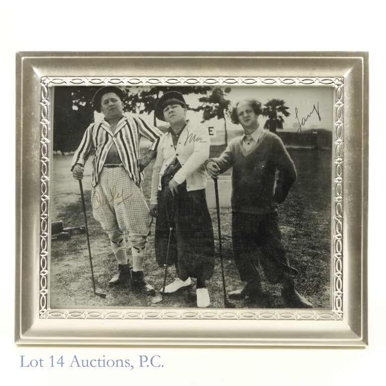 Three Stooges Signed Golf Picture: 8" x 10" black & white photograph of Curly Howard, Moe Howard, and Larry Fine from the 1935 Columbia Pictures short film "Three Little Beers". The picture is signed "Curly". "Moe", and "Larry". Frame