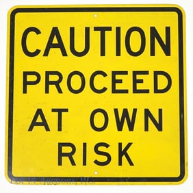 Caution Proceed At Own Risk Road Warning Sign