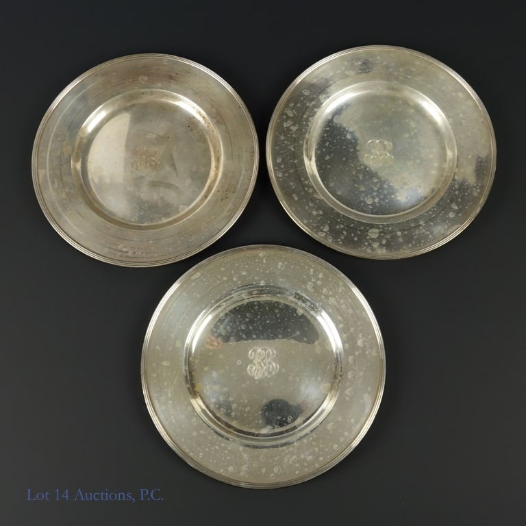 Gorham Sterling Silver Plates (3): Three Gorham plates. Bottom stamped "GORHAM STERLING A5750". Fronts are engraved with initials. 6-3/8" diameter. Total weight of the three plates: 315 grams.