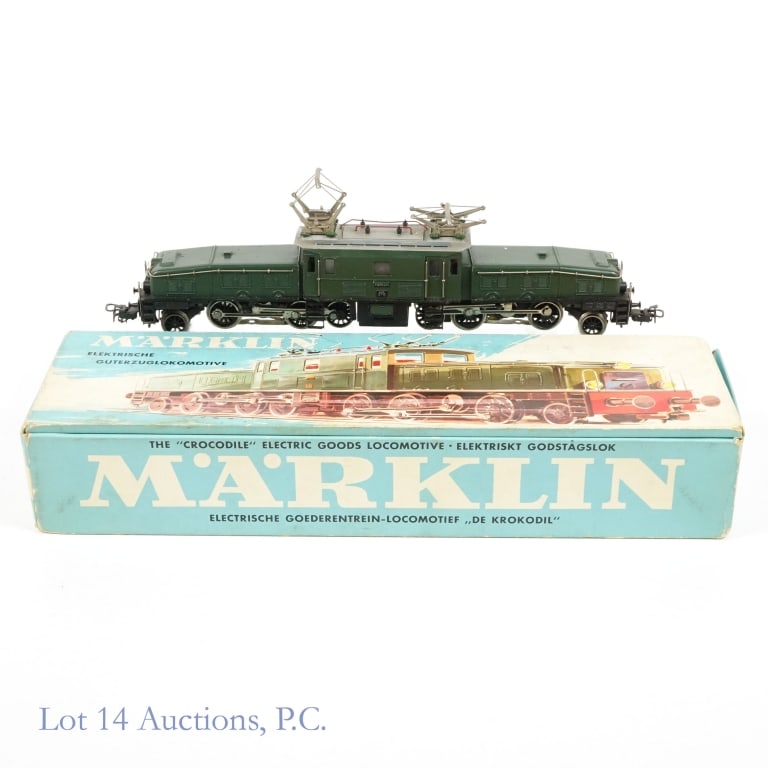 Marklin Crocodile, #3015, HO Locomotive w/ Box: Marklin Crocodile, #3015, HO Locomotive w/ Box. The "Crocodile" Electric Goods HO Gauge Locomotive from Marklin in original packaging. Blunted corners, dirt and general wear on box. Locomotive appears