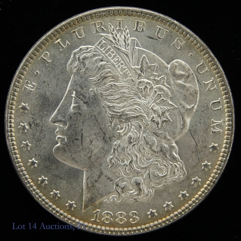 1883 (P) USA Silver Morgan Dollar (CH BU): 1883 (P) United States silver Morgan dollar (Philadelphia Mint). Designer George T. Morgan. Per consigner, grades CH BU / proof quality with slight toning around edges. Sealed in a Tangible Asset Mana