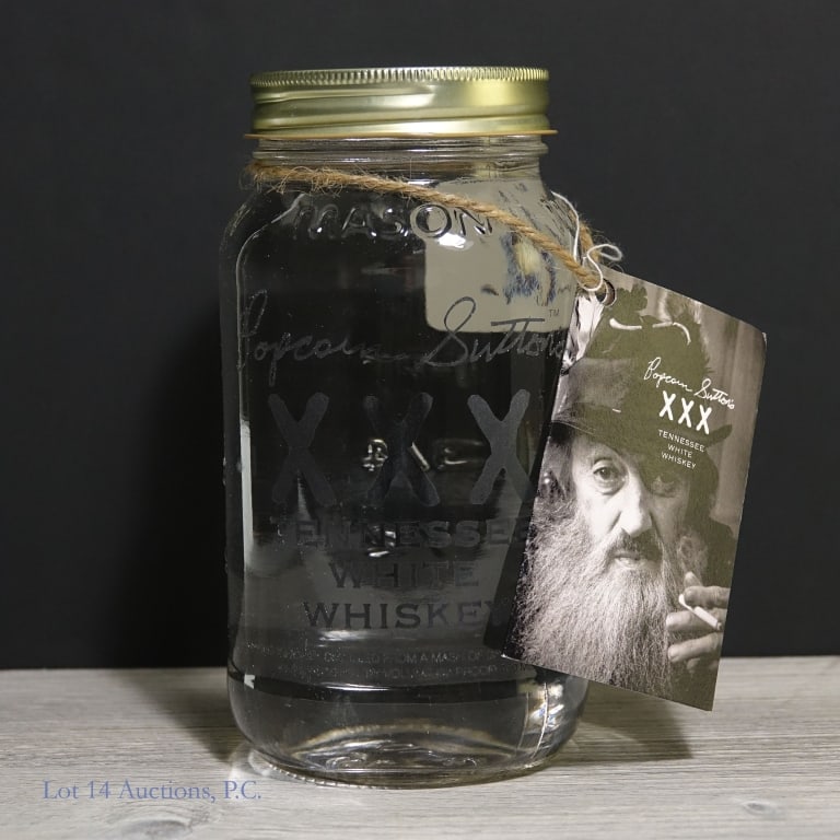 Popcorn Sutton's XXX Tennessee White Whiskey: Popcorn Sutton's XXX Tennessee White Whiskey, 93 Proof, 750 ml. Neck tag included.