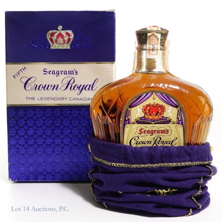 1961 Crown Royal Canadian Whisky: 1961 Crown Royal Canadian Whisky, 80 proof, 4/5 quart. Cello is cracked, strips are good. Very good fill, with bag and (poor condition) box.