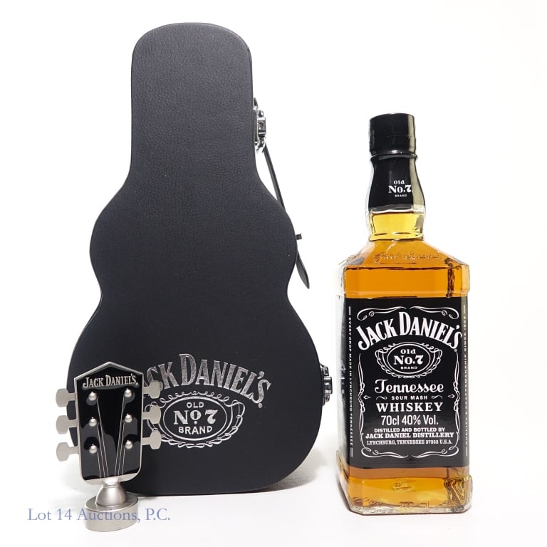 Jack Daniel's Whiskey Guitar Case Gift Set: Jack Daniel's Tennessee Whiskey, 80 Proof, 700 ml. Gift Set includes a limited edition Jack Daniel's bottle stopper and the Jack Daniel's guitar case to hold full set. With gift card.