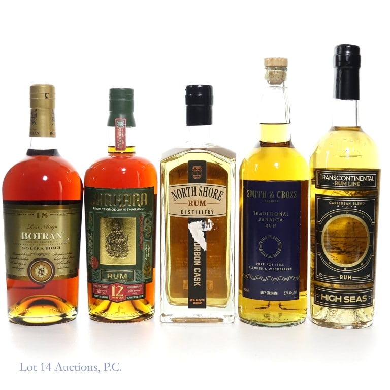 Mixed Rum Lot / Included 12 Year & 18 year (5): Five (5) bottles total in this lot. 1-18 Year Old Ron Anejo Botran Solera 1893 Rum. 750ml. 40% ABV. Light damage to front label. Light wear on back label. 1- Shakara Thailand 12 Year Rum. Aged in oak 