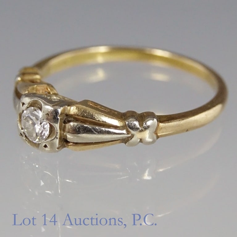 14k Yellow Gold & Diamond Ring: Yellow gold ring with single central stone. Ring marked "14k" and "Multi-Facet". Metal tests electronically for 14 karat gold. Stone tests electronically as diamond. Size: 6. Weight: 2.10 grams.