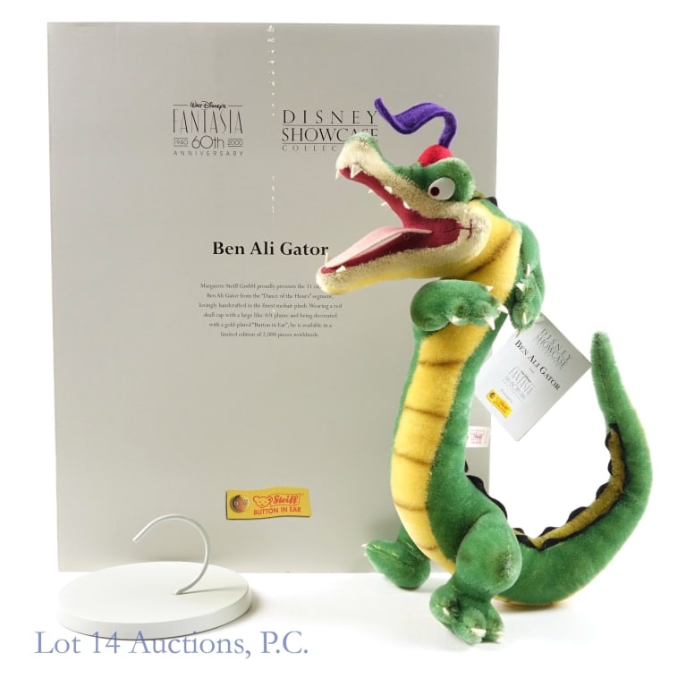 Steiff Fantasia Ali Gator, CIB #282/2000: Steiff Fantasia Ali Gator, CIB #282/2000. Limited edition Steiff, "Button in Ear" Ben Ali Gator from the 1940 classic Disney film Fantasia. Item is complete in box with tags attached. Box shows some s