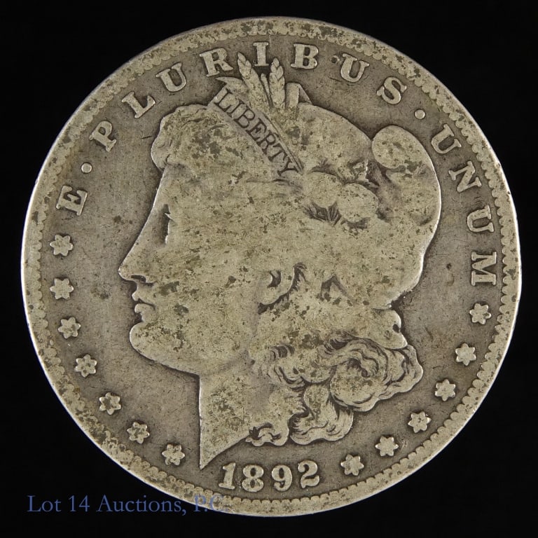 1892-S Silver Morgan Dollar-Semi-Key Date: 1892-S United States silver Morgan dollar (San Francisco Mint). Designer George T. Morgan. Per consigner, rare in any grade. Metal is 90% silver, weighs 26.73 grams and diameter 38.1 mm. Mintage 1,200
