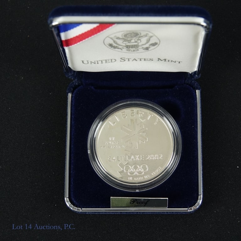 2002 (P) USA Silver Proof Winter Olympics $1: 2002 (P) United States silver proof Salt Lake City Olympic winter games commemorative dollar (Philadelphia Mint) in OGP with COA. Designers: obverse John Mercanti and reverse Donna Weaver. Per consign