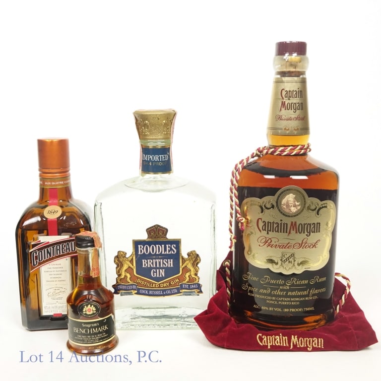 Boodles, Benchmark, Cointreau, Captain Morgan (4): 1 - Boodles British Gin, 94.4 Proof, 4/5 quart. U.S. Internal Revenue, Series 112 tax strip intact. 2 - Seagram's Benchmark Bourbon Mini, 86 Proof, 1/10 Pint. Tax strip is broken two times. 3 - Cointr