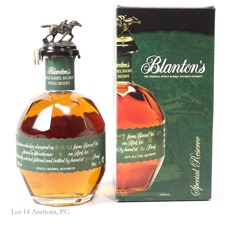 Blanton's Green Label SB Bourbon "T" *SEAL BROKEN*: Blanton's Green Label Single Barrel Bourbon, 80 Proof, 700 ml, Letter T, Dump Date: 8-7-23, Barrel #110, Bottle #34. *WAX SEAL IS BROKEN BY PLASTIC TABS*. Right plastic tab is loose. The bottle still
