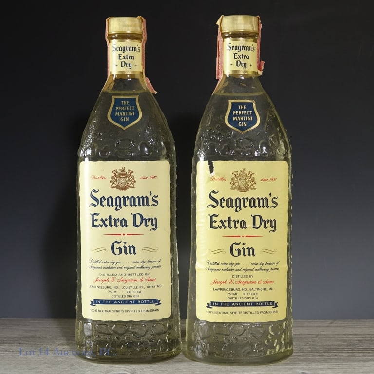Seagram's Extra Dry Gin (2): 2 bottles of Seagram's Extra Dry Gin. 1 of the bottles has a peeling / ripped label and tax strip.. Both bottles are 80 proof, 750 ml.