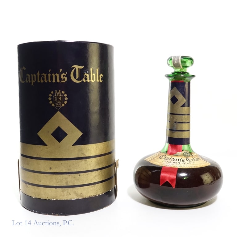 Captain's Table Canadian Whisky ***UNSEALED***: Captain's Table Canadian Whisky, 25 fluid ounces, Proof unstated. ** Seal is broken but bottle seems to be full.** Includes box and booklet.