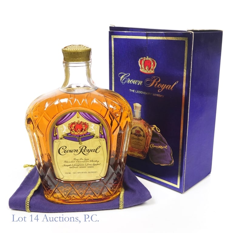 1982 Crown Royal Fine De Luxe Canadian Whisky: 1982 Crown Royal Fine De Luxe Blended Canadian Whisky, 80 Proof, 750 ml, Distilled: 1978. Tax strip in good condition with only slight peeling. Box and bag are included. Please see photos for addition
