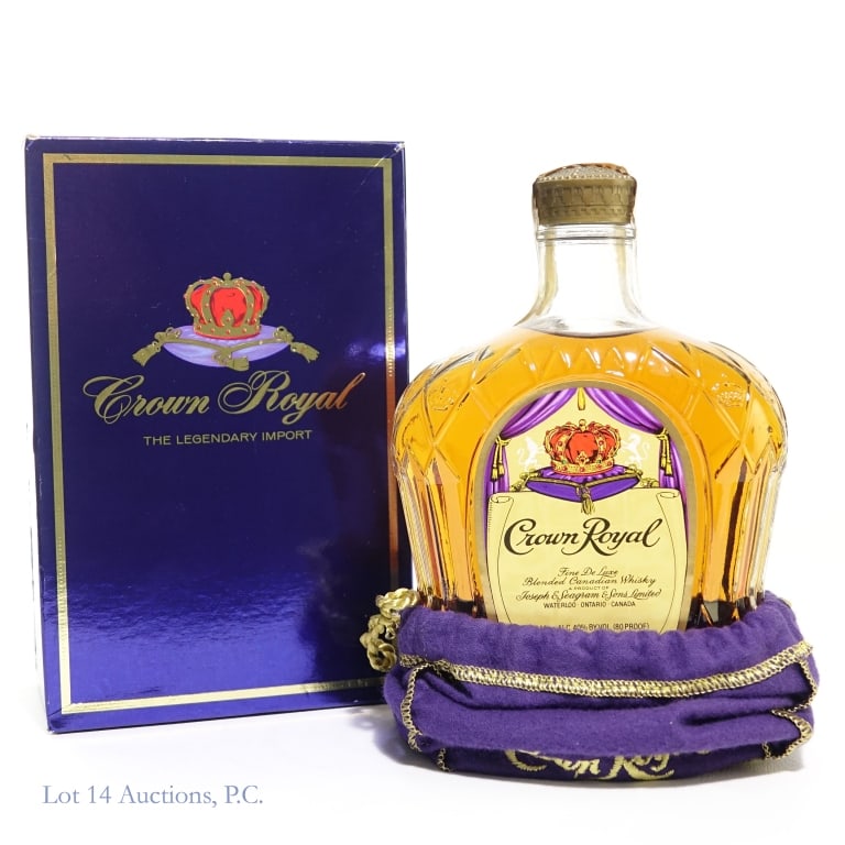 1980 Crown Royal Canadian Whisky: 1980 Crown Royal fine de luxe blended Canadian whisky. 40% ABV (80 proof). 750 ml. Purple drawstring bag and box included.
