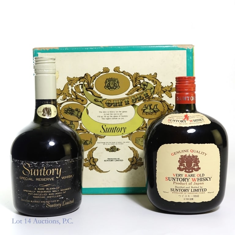Suntory Whisky Gift Set (2 bottles): 1 - Very Rare Old Suntory Whisky, 86 proof, 760 ml. 2 - Suntory Special Reserve Whisky, 760 ml, 86 proof. Bottle is smudged and label is damaged. See photos for additional details.