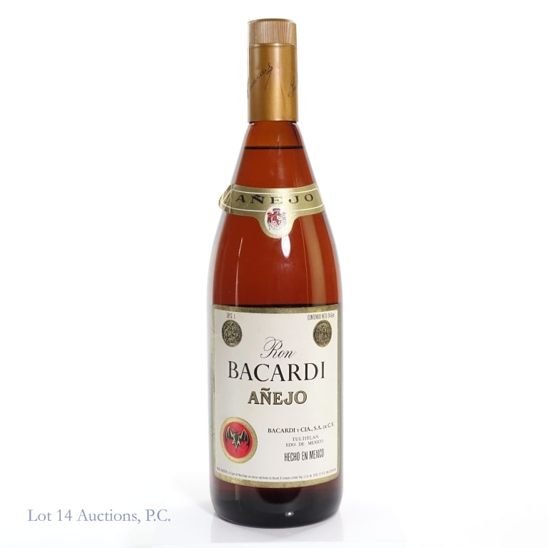 1970s Ron Bacardi Anejo Rum: Ron Bacardi Anejo Rum, 76 Proof, 946 ml, estimated to have been bottled in the 1970s. Tax strip worn and torn but intact overall. Please see photos for additional details.