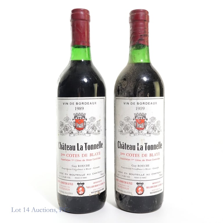 1989 Chateau La Tonnelle Bordeaux Wine (2): Two (2) bottles of 1989 Aquitanae Chateau La Tonnelle 1res Cotes De Blaye Bordeaux Red Wine. Product of France. 12.5% Abv, 750 ml. See photos for label / capsule damage, condition and details.