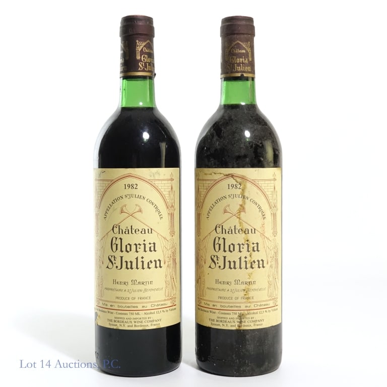 1982 Chateau Gloria St. Julien Wine (2): Two (2) bottles of 1982 Chateau Gloria St. Julien Henri Martin Red Bordeaux wine. 12.5% Abv, 750 ml. Some label damage. See photos for label / capsule damage, condition and details. Product of France.