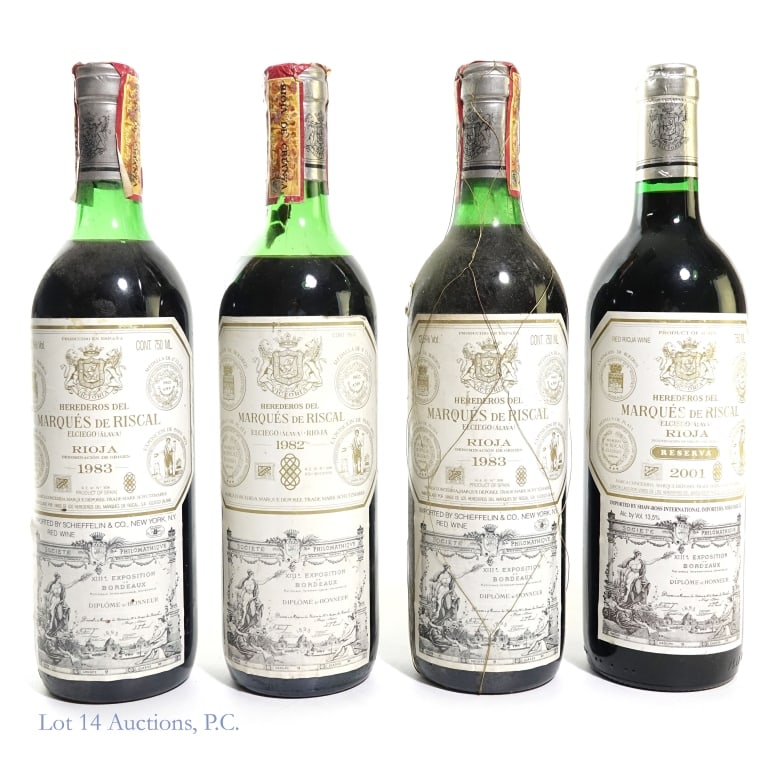 Marques De Riscal Rioja Red Wines (4): 2001 Reserva, 1982, 1983 (x2), Herederos Del Marques De Riscal Rioja Red Wine bottles. **1982: LOW FILL** Products of Spain. 750 ml / 75 cl. 2001: 13.5% Abv, 1983: 12.5% Abv, 1982: Abv is unknown. See