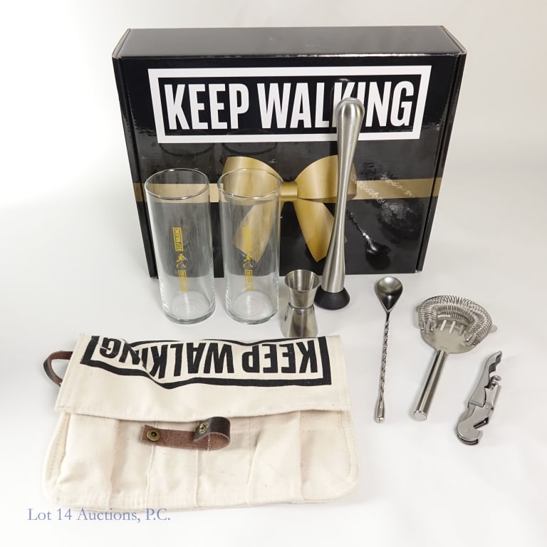 Johnnie Walker "Keep Walking" Cocktail / Bar Kit: Keep Walking Gift set by Johnnie Walker. No bottle of liquor in the box but it does include 3 drink recipes, 2 keep walking glasses, and cocktail / drink making kit.
