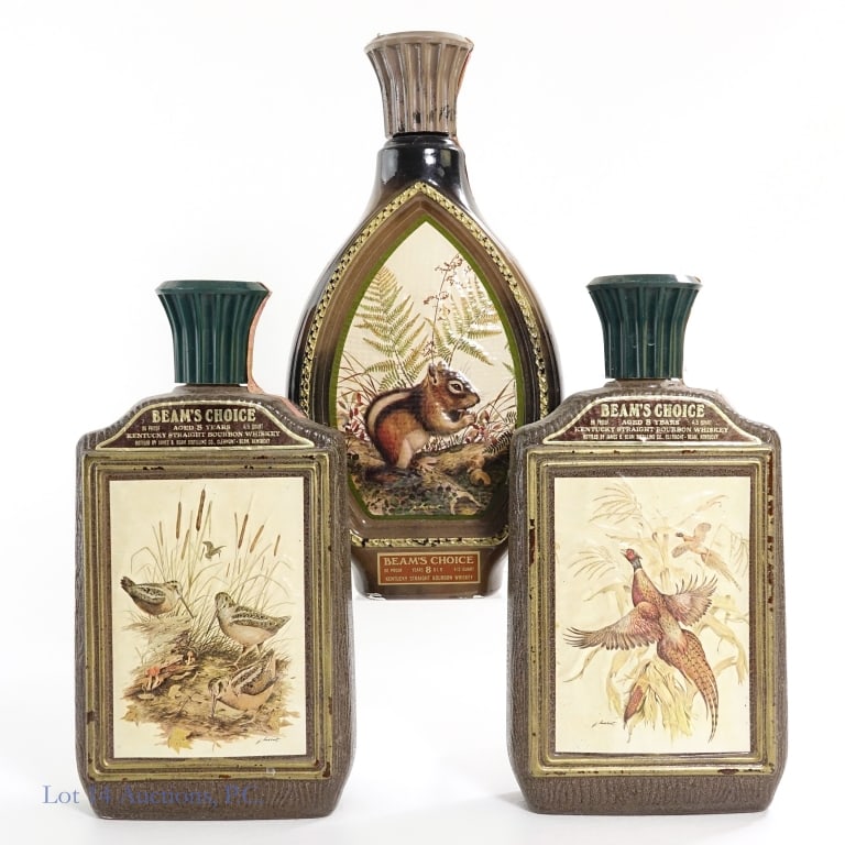 Beam's Choice 8 Yr. Bourbon Lockhart Decanters (3): Three (3) Beam's Choice 8 year old Bourbon Whiskey Lockhart decanters. The woodcock and pheasant decanters are 86 proof. The chipmunk decanter is 80 proof. All decanters are 4/5 quart. Each weighs 2.9