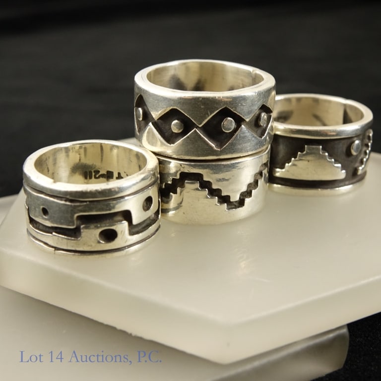 Sterling Silver Mexican Taxco Rings (4) (56g): 4 Mexican Taxco Sterling Silver rings. Lot weighs 56g/1.8ozt. All rings are marked 925. Rings are size 7 1/2, 8 1/2, 10, and 10. Some signs of tarnish/age on the insides of the rings only.