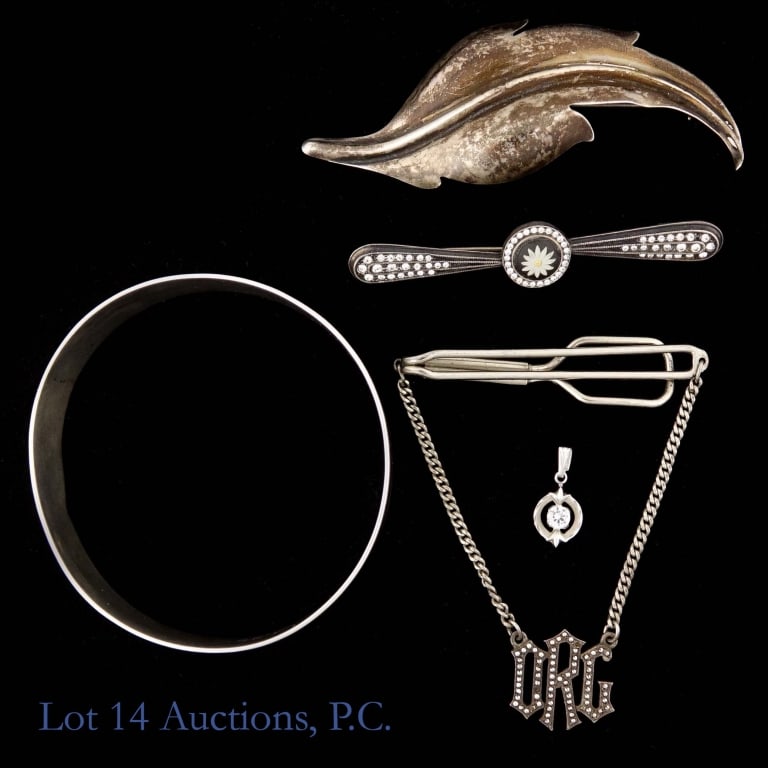 Assorted Sterling Silver Jewelry: Five pieces of sterling silver jewelry: A bangle with the initials EES engraved on the outside, and "sterling EL" written on the inside; a small charm with a white stone (possibly spinel, quartz, or s