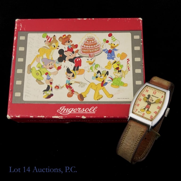 1940's Ingersoll Mickey Mouse Disney Watch: A rectangular watch featuring Mickey Mouse, with his arms as the clock hands. Watches like these were produced in the mid-late 1940s, and this appears to be authentic. On a well-loved leather band, bu