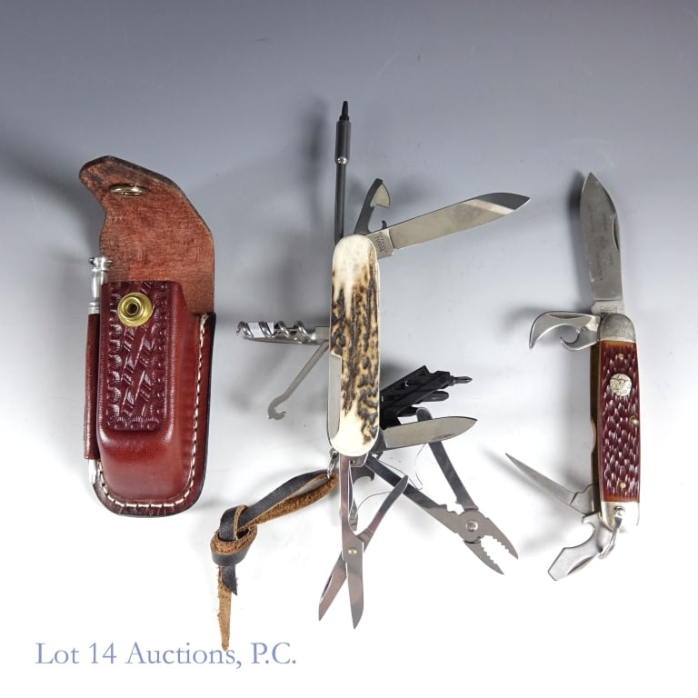 Victorinox Swiss Champ & Boy Scout Knives (2): Victorinox Swiss Champ & Boy Scout Knives (2). Victorinox Swiss Champ knife with leather pouch and sharpening steel. Camillus Boy Scout knife. Both knives well maintained, sharp, minimal to no wear. S