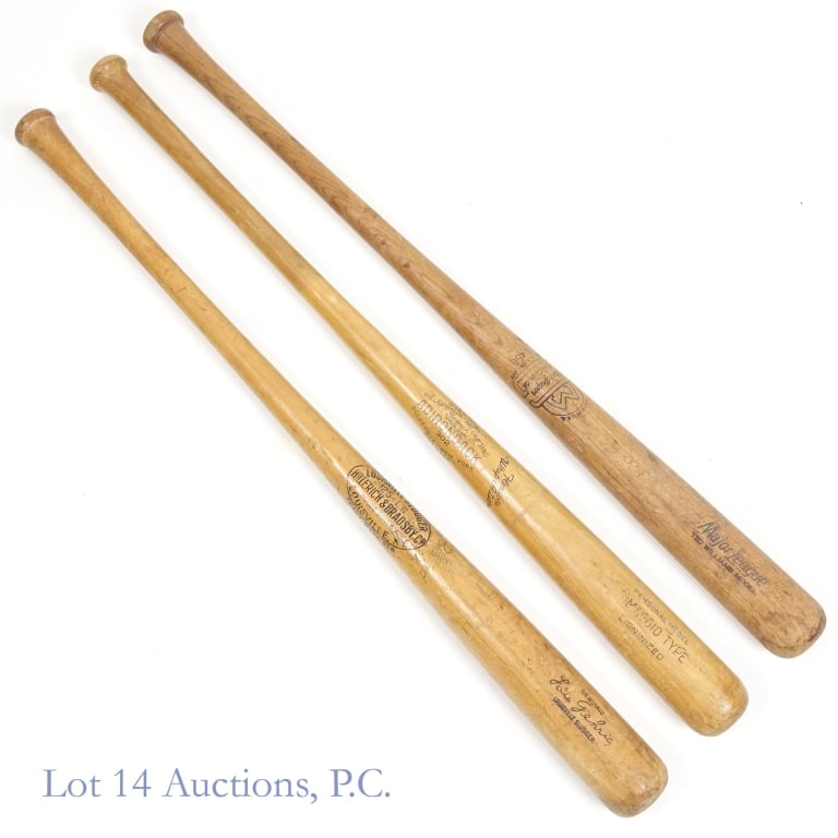 Gehrig DiMaggio Williams Model Baseball Bats: 3 vintage baseball bats. All of these bats have signs of wear and use. Hillerich & Bradsbury Co. Louisville Slugger 125 - L.G. model baseball bat with facsimile Lou Gehrig signature on the barrel. "35
