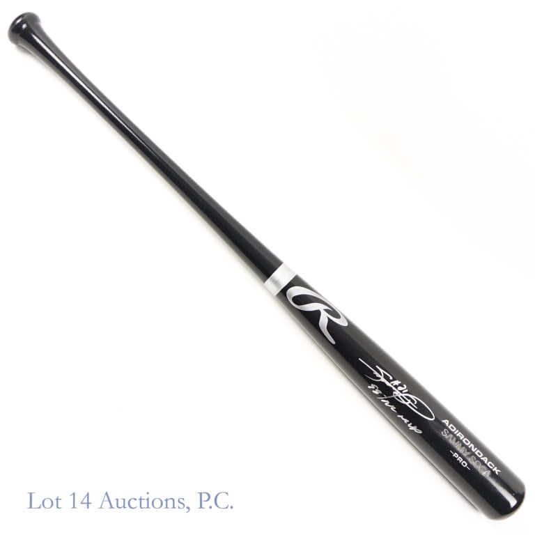 Sammy Sosa Signed Baseball Bat (JSA Wit Cert): Rawlings Adirondack Pro Sammy Sosa model baseball bat. Signed in silver by Sammy Sosa and inscribed "98 NL MVP". JSA Witnessed cert (WA681853) and matching sticker (on knob). We have confirmed this at