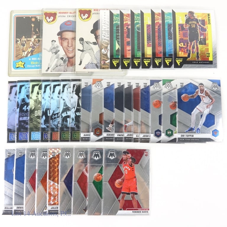 37 Assorted Sports Trading Cards: This is a mixed lot of sports cards covering football, baseball, and basketball. Among the treasures we found two 1954 Topps baseball cards, a 1972-73 Topps basketball card, Upper Deck Dan Marino Memo
