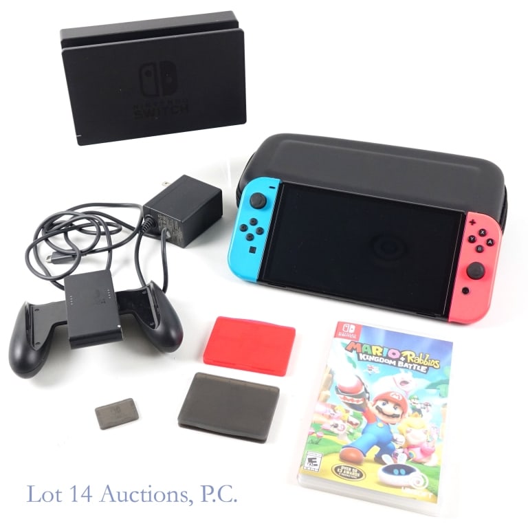 Nintendo Switch Console / Mario + Rabbids Game: Nintendo Switch Console. Includes USB-C charger, zip case, 2 plastic containers for games, joy con grip, charging dock, and Mario + Rabbids Kingdom Battle game. Tested and working.