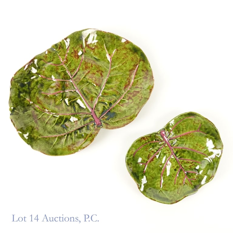 Dodie Thayer Seagrape Leaf Plates (2): 2 Dodie Thayer ceramic Seagrape Leaf plates. These plates are meant to resemble green leaves and have a nice glossy finish. Both marked "Dodie Thayer" at the bottom. These plates measure 7.5"L x 10.25