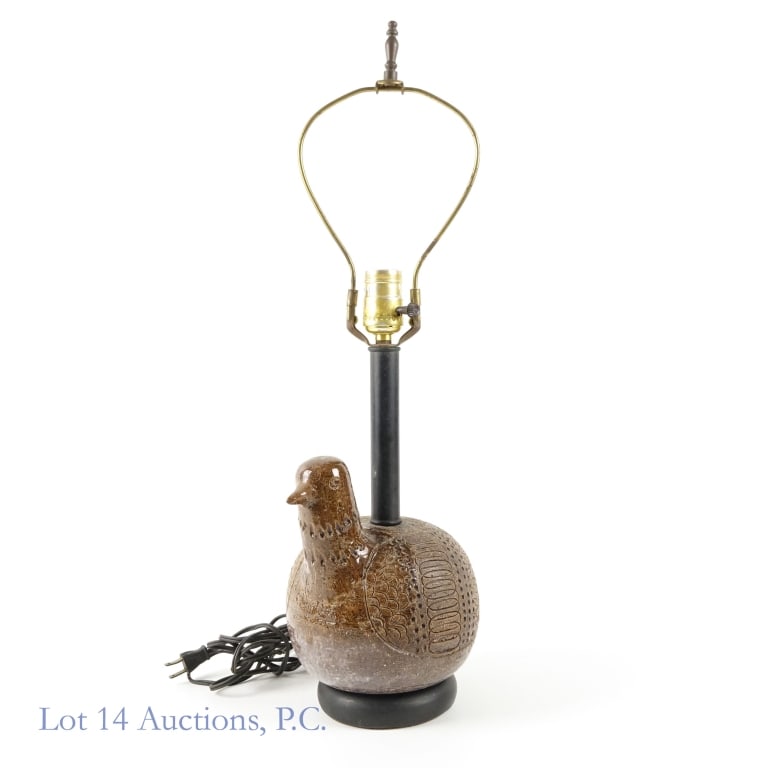 Aldo Londi Bitossi Partridge Bird Table Lamp: An Aldo Londi Bitossi partridge or bird table lamp from the 1960s. The bottom of the lamp has a brown ceramic partridge bird with geometric carvings and a glossy finish on the front half. Measures 23.