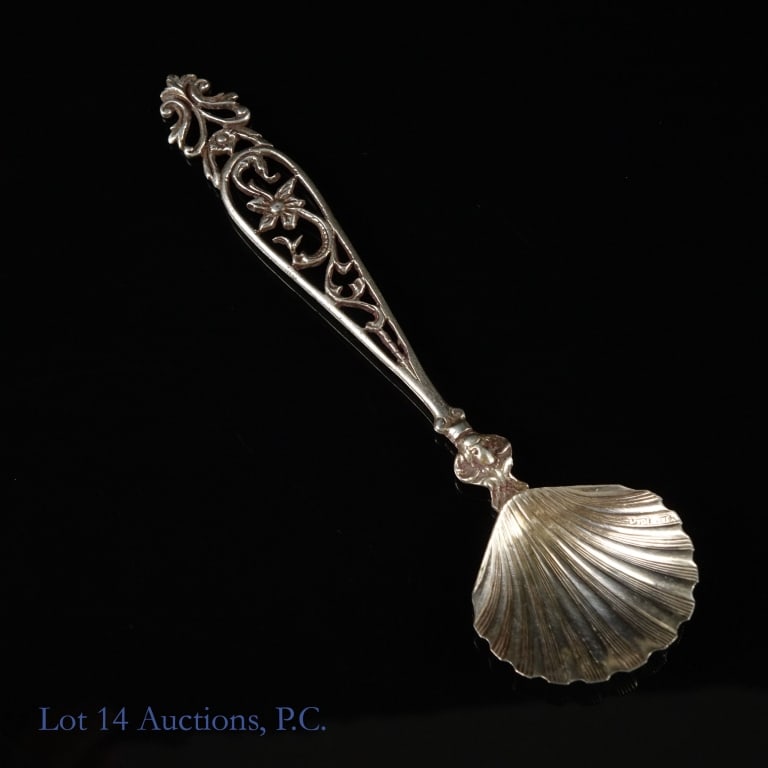 Antique Italian Art Nouveau Sterling Silver Spoon: Art Nouveau style silver tea caddy spoon with "made Italy" [sic] stamped on the back. Ornate filigree detailing on the handle and a scallop shell design for the bowl. Electronically tests as .925 ster