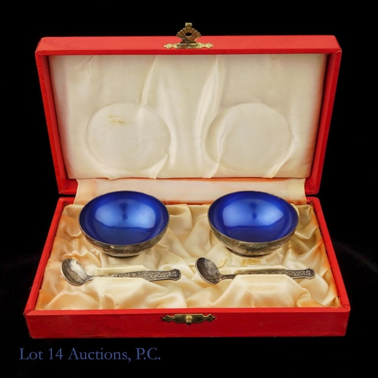Meka Denmark Sterling Salt Cellars w/ Spoons: A pair of sterling silver salt cellars from Meka Denmark with a navy blue enamel coating on the inside. They are about 1'' tall and 2'' wide. There are a matching pair of 2.5'' sterling spoons include