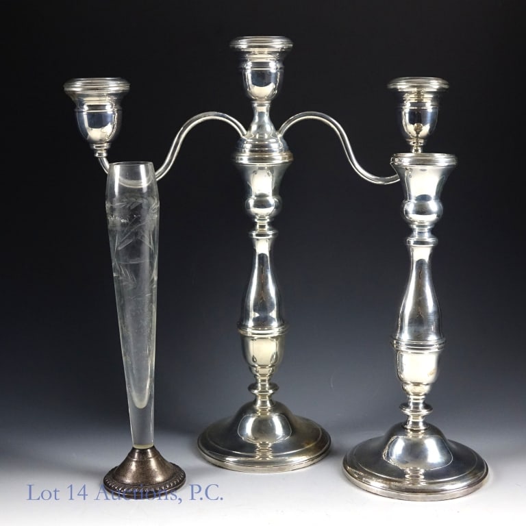 Sterling Silver Holloware Vase, Candlesticks: Lot of 3 pieces of weighted Sterling silver. The first is a Crystal Bud Vase in the Duchin Creation style. It is about 9.5'' tall and has a 2.5'' diameter. Glass / Crystal vase attached to weighted st