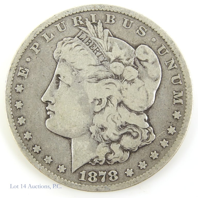 1878-CC USA Silver Morgan Dollar - Carson City -VG: 1878-CC United States silver Morgan dollar (Carson City Mint). Designer is George T. Morgan. Per consigner, grades VF. Metal is 90%-silver and weighs 26.73 grams. Mintage is 2,212,000 with a PCGS surv
