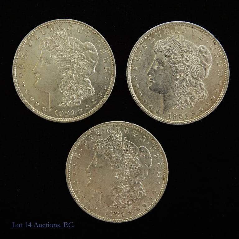 1921 (P) USA 90%-Silver Morgan Dollar - CH BU -3: Three (3) 1921 (P) United States silver Morgan dollars (Philadelphia Mint). Designer George T. Morgan. Per consigner, grades CH BU. Metal is 90% silver and weighs 26.73 grams each. Silver content conf