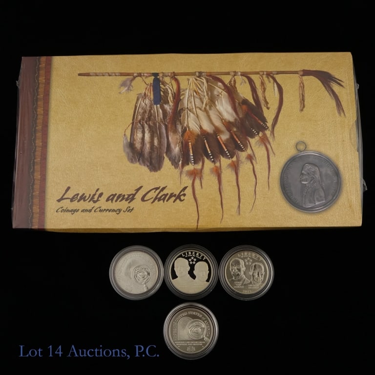 U.S. Mint 90%-Silver & Clad Coins & Exonumia (5): Four 90% silver half dollar commemorative coins and the (sealed) Lewis and Clark Coinage and Currency Set - A partnership project of the U.S. Mint and National Archives and Records Administration. Fiv
