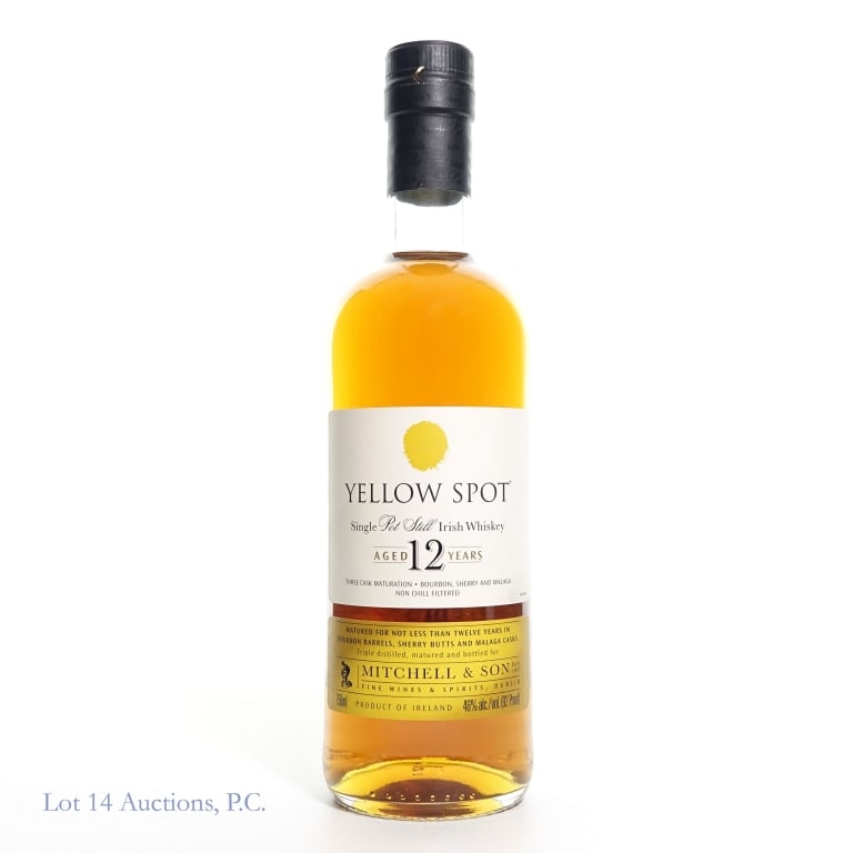 12 Year Yellow Spot Whiskey: Yellow Spot whiskey from Ireland by Mitchell & Son. Aged 12 years, three cask maturation. 750ml, 46% ABV. Bottle and capsule in very good condition. See photos for details.