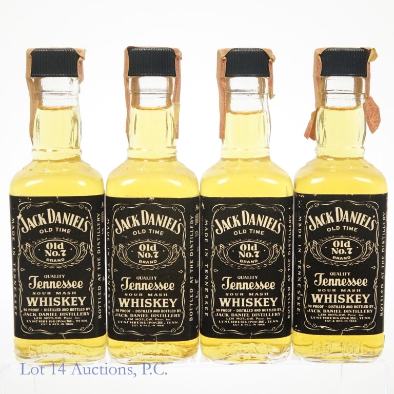 Vintage Jack Daniel's Sour Mash Minis (4): Lot of four miniature bottles (50 ml) of Jack Daniel's Tennessee sour mash whiskey, 90 proof. Tax strips date to the 1980s.